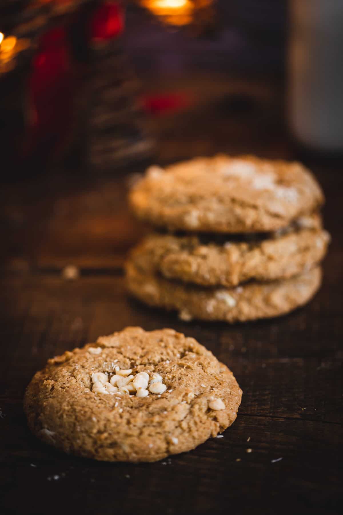close up on cookie with cookies stacked behind