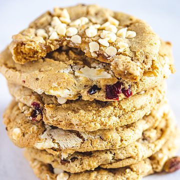stack of cookies with top cookie with bite taken out