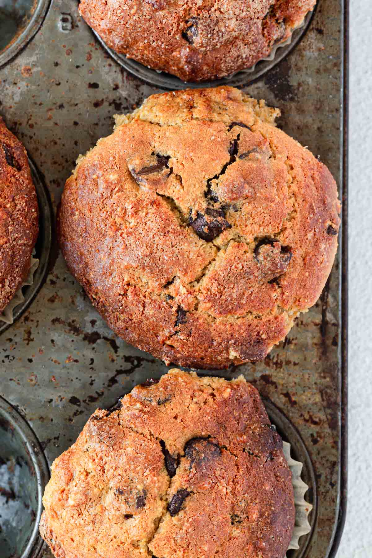 overhead of gluten free chocolate chip muffins in tray